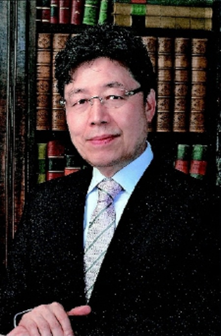 人民政協(xié)報專版：香港鉅榮公司董事長袁木榮傾情一帶一路